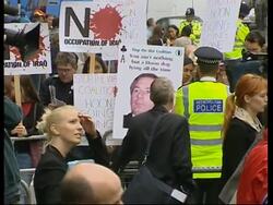 UK defence secretary's arrival at Hutton inquiry, protests News Clip