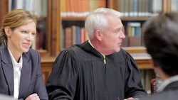 Judge and lawyers talking in meeting Stock Footage