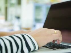 Woman using laptop computer Stock Footage