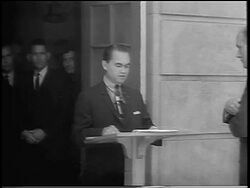 B/W 1963 George Wallace speaking at podium / blocking Black students from entering U. of Alabama Stock Footage