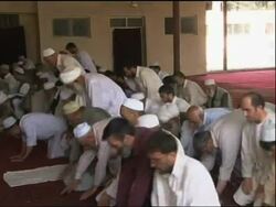 Reax to Quran burning plan; Merkel, Jolie; pastor's frmr colleague News Clip