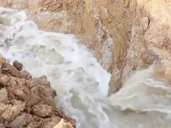 Water flow in the grooves soil. Stock Footage