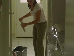 MS, TU, Woman mopping tile floor in laundry room, Hollywood, California, USA Stock Footage