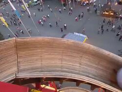 visitor slides down chute of "Toboggan" Stock Footage