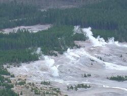 WS AERIAL View of fire hole from the soil / Wyoming, United States Stock Footage