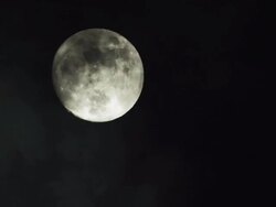 FULL MOON WITH CLOUDS-TIME LAPSE Stock Footage