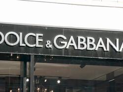 CU, Dolce & Gabbana sign on building exterior, Madison Avenue, New York City, New York, USA Stock Footage
