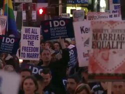 2009 MS FOCUS People with placards marching at a rally in support of same-sex marriage/ San Francisco, California, USA/ AUDIO Stock Footage