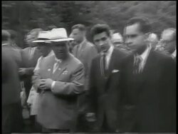 B/W 1959 Vice President Nixon walking with Soviet Premier Khrushchev outdoors / newsreel Stock Footage