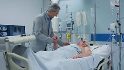 DS Man visiting father in the intensive care Stock Footage