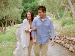 Chinese couple walking outdoors together Stock Footage
