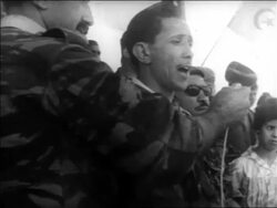 B/W 1960s Army of Liberation leader speaking at rally / Algeria / educational Stock Footage