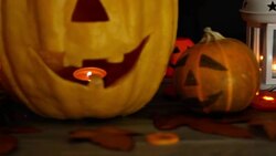Halloween pumpkin head jack lantern on wooden background Stock Footage