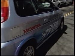 Manufacturers show off cars in alternative fuel show News Clip