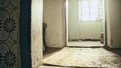 Despaired young woman in an abandoned house Stock Footage