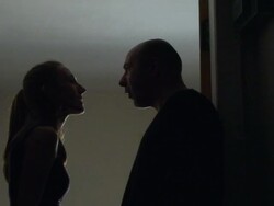 Silhouetted man and woman arguing in hallway Stock Footage