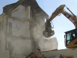 MS Demolition of apartment block / Saarburg, Rhineland-Palatinate, Germany Stock Footage