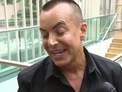 INTERVIEW - Julien Macdonald on the wedding dresses in his show and where he finds inspiration at Julien Macdonald SS15 Stock Footage