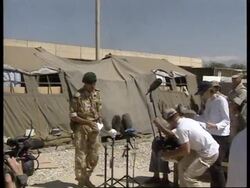 WRAP British troops on patrol in the Tora Bora region where arms cache was discovered Instructional Video