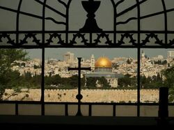 Signs of Christianity and Islam with Jerusalem Skyline Stock Footage