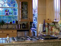 Wide shot zoom out empty kitchen in house Stock Footage