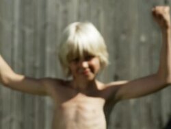 Boy with muscles (Shot on Red) Stock Footage