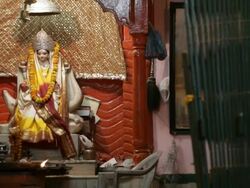 MS Candles burning in front of shrine at night / Varanasi, India Stock Footage