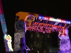 MS Shot of People enjoying amusement ride with Cologne Cathedral in back side Funfair / Cologne, Germany Stock Footage