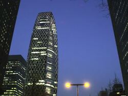 West Shinjuku Buildings early evening, low angle pan, Tokyo, Japan Stock Footage
