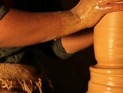 Tunisian Potter makes traditional pottery Stock Footage