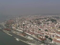AERIAL WS Cityscape at waterfront / Lisbon, Portugal Stock Footage