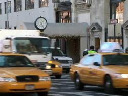 WS View of Traffic on fifth Ave by Sherry Netherland hotel / New York City, New York, USA  Stock Footage