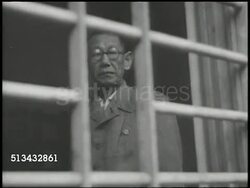 1945: JAPANESE PRIME MINISTER HIDEKI TOJO: VS Japan Prime Minister Hideki Tojo (1884-1948) & other Japanese officers imprisoned at Omori Prisoner of War camp, Tojo eating inside, walking outside w/ others. Tokyo War Crimes, Post World War II, WWII Instructional Video