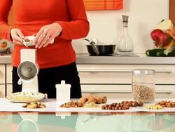 HD: Grinding Walnuts Stock Footage