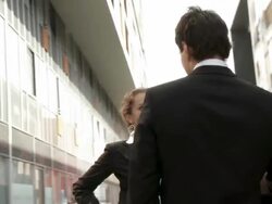 HD STEADYCAM: Business Couple Having A Conversation Stock Footage