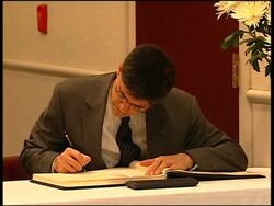 US official signs book of condolences to late president Kim News Clip