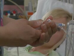 Pregnant woman being infused with hydrated solution  Stock Footage
