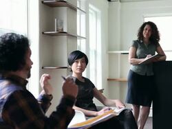 MS R/F three coworkers in discussion in office/Seattle, Washington, USA Stock Footage