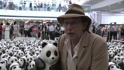 1600 hundred model pandas made from recycled paper invade airport Instructional Video
