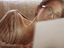 Laptop sofa flare      RE CM Stock Footage