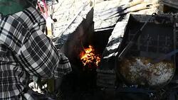 Blacksmith working on metal Stock Footage