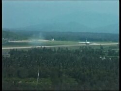 WRAP Adds pictures of Russian plane landing in Hainan to rescue spy-plane News Clip