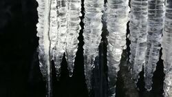 Icicles on a stream in the Lake District, UK Stock Footage