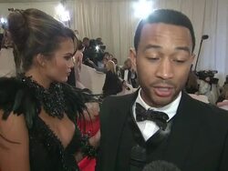 INTERVIEW: Christine Teigen and John Legend, Legend shares what he thinks of bin Laden's capture, says fashion designers are artists at the 'Alexander McQueen: Savage Beauty' Costume Institute Gala At The Metropolitan Museum Of Art at New York NY. Stock Footage