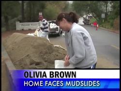 Residents across California worried Tuesday about possible flash floods and mudslides as a storm began showering areas devastated by wildfires. News Clip