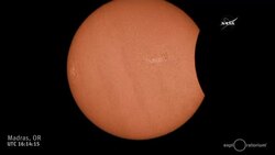 Eclipse Begins over Madras, Oregon News Clip