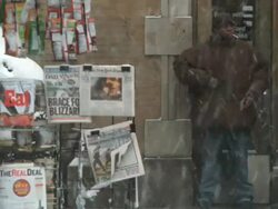 WS View of Newsstand with man trying to light cigarette / New York City, New York, USA  Stock Footage