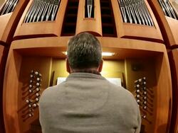 MS TU Organist at church organ playing / Saarburg, Rhineland-Palatinate, Germany Stock Footage