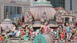 Colorful statues cover the Gopuram of the Sri Mariamman Temple in Singapore. Stock Footage