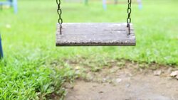 Wooden swing at playground. Stock Footage